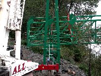 First section being lifted through the west tower - Click for larger image